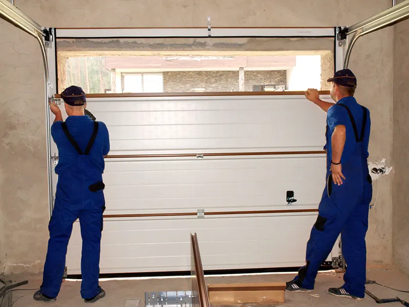 Chantier de porte de garage réalisé à Caluire-et-Cuire par Volets Lyonnais